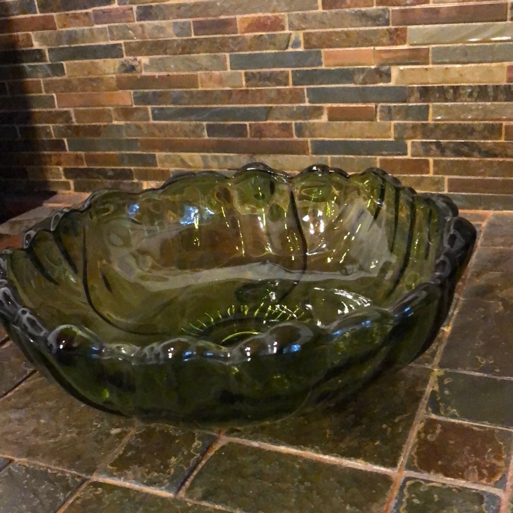 Vintage Indiana glass 3 toed bowl in sunflower pattern.